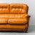 Three-seater sofa. Brown leather upholstery with wooden frame and legs. Good condition. Signs of wear, as shown in photos.