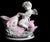 I love this absolutely adorable porcelain cupid riding a “classical” dolphin on waves. So French! It has a delicate...