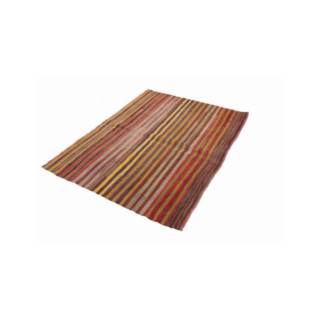 Handwoven vintage striped decorative kilim rug from Denizli region of Turkey. Approximately 50-60 years old. In very good...