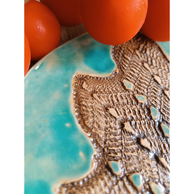 Plate/tray. Suitable as a candle holder or object holder. The piece is entirely handcrafted; the first firing (first...