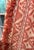 Pair of stunning custom drapery panels in Cowtan & Tout's Rapallo in coral with Samuel & Sons cabana tassel fringe in...