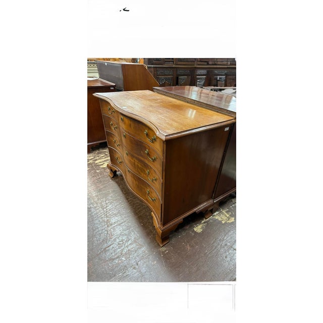 Scarce 18th century American Chippendale Cherry Serpentine Chest of Drawers with original or period brasses. Warm aged...
