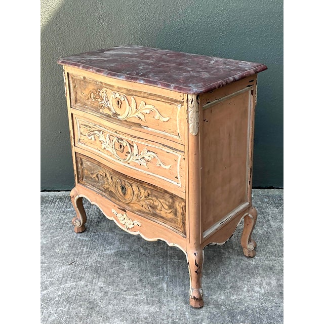 This exquisite French Provincial petite commode captures the timeless romance of the Louis XV period, offering a soulful...