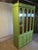 Vintage Chinoiserie Style china cabinet by Drexel for its Kensington line, circa 1960s. Painted faux bamboo and faux...
