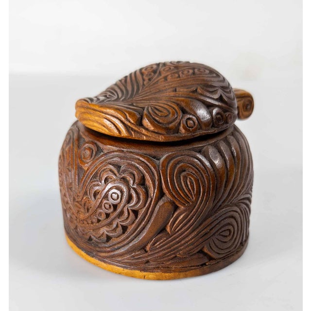 We are selling this great early 20th century Carved Maori inkwell. This inkwell has traditional Maori carving in a...