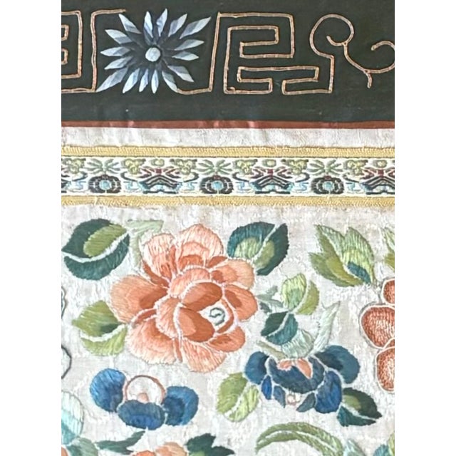 This piece of embroidery was cut from a sleeve of an antique Chinese silk kimono. The detail photographs show examples of...