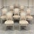 Set of 8 French Louis XVI painted dining chairs, designed with the restrained symmetry and graceful architecture that made...