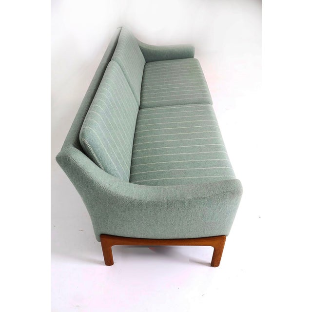 Danish Modern 4-Seat Teak Base Sofa, Original Fabric Presents Well Offered for sale is a mid-century Danish Modern sofa...