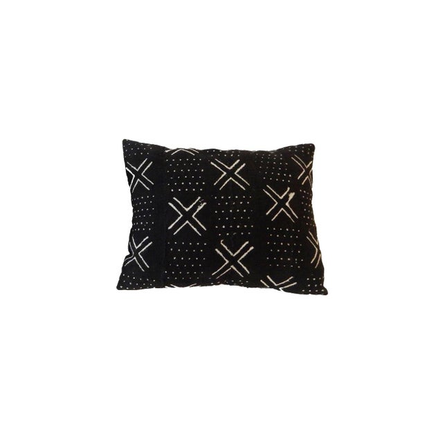 Superb custom-made pillow crafted from handmade African bogolan (mud cloth) textile featuring striking geometric patterns...