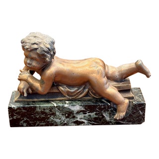 Vintage Reclining Putti on Marble Base For Sale