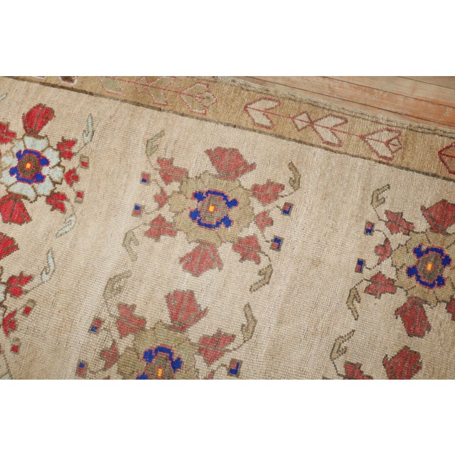3rd quarter of the 20th Century Turkish Kars rug with an all over floral design on an ivory field Measures: 5'7'' x 8'1''