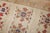 3rd quarter of the 20th Century Turkish Kars rug with an all over floral design on an ivory field Measures: 5'7'' x 8'1''