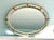 Venetian style Hollywood Regency oval mirror with brass details. Spain. Oval shaped mirror with triple layered mirror...