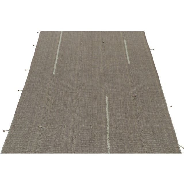 Handwoven in wool, this 8x12 Kilim design is from a bold new line of contemporary flatweaves by Rug & Kilim. Further On...