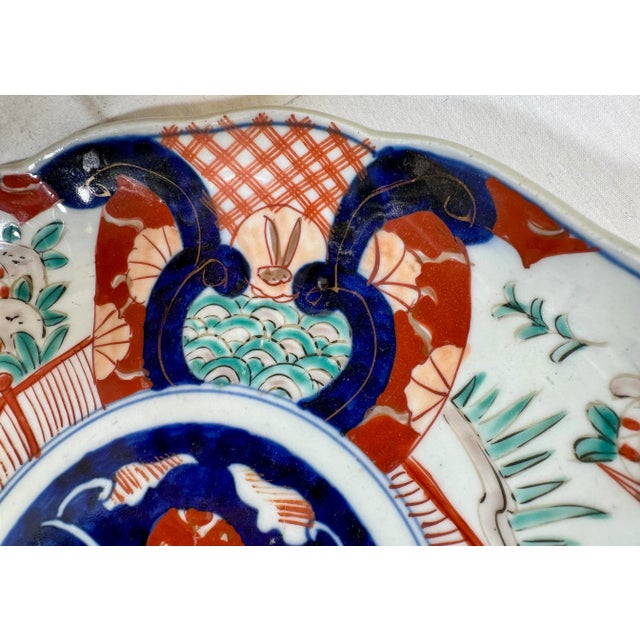 Vintage Scalloped Edge Imari Plate Decorated With Colorful Birds & Rabbits From Japan - Circa 1940. Measures 9 5/8” W x 9...