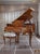 Transform your space with this breathtaking Louis XVinspired grand piano, a true masterpiece of craftsmanship and...