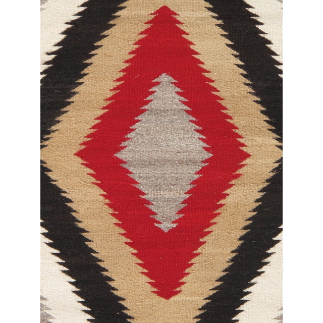 Rhythm of the Four Directions: A Mid-20th Century Navajo Chevron Rug, Handmade For Sale - Image 16 of 18