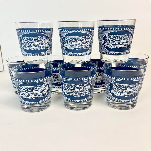 Classic Currier and Ives design in their famous Blue pattern. This set of 10 Double Old Fashion glasses feature a woman on...