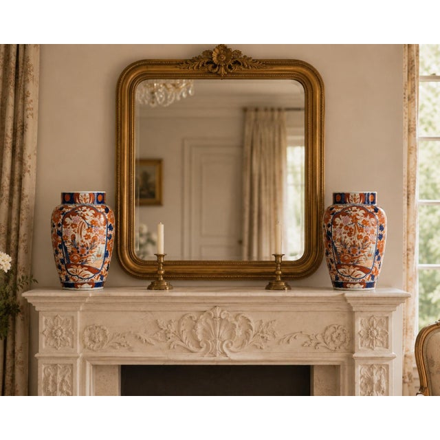 A gorgeous pair of antique 19th-Century Japanese Imari vases made in the Meiji period, circa 1870. These fine vases have a...