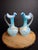 An exceptional, matched pair of late 19th-century Victorian cased satin glass ewers (water pitchers). Each piece is...