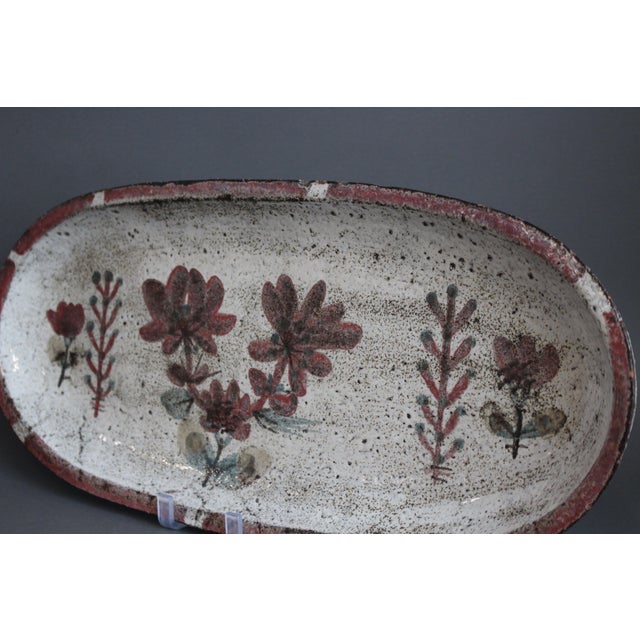 Mid-century French ceramic tray by Gustave Reynaud for Le Mûrier (circa 1960s). Sizeable, oblong-shaped tray with raised...