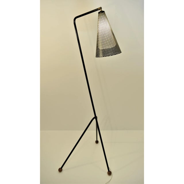 A very rare Swedish Modern floor lamp, designed in the late 1940´s by Hans Bergström. The lamp shade is made of two...