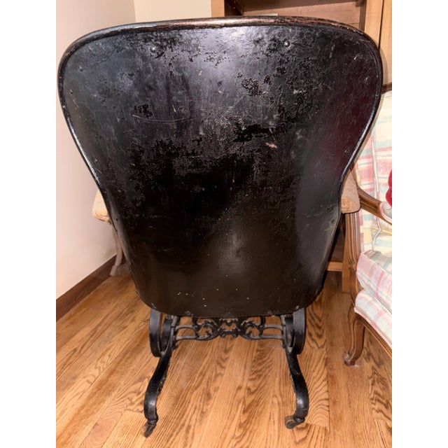 I'm told this was a Victorian Office Chair. 1800's As far as I'm aware , it's in its original form. Spring arm chair...