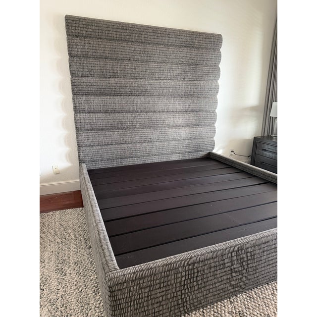 This is a custom-made California King bed frame, commissioned specifically for a private residence and crafted with...