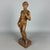 A striking and slender tabletop sculpture in the round depicting Michelangelo's famous David, a fine example of Italian...