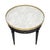 Side table from France in the Louis XVI style. This charming side table is made of solid wood construction, primarily...