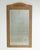 A large-scale French Art Nouveau mirror dating to circa 1910, crafted in wood and designed with a strong vertical...