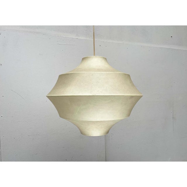 Mid-Century Modern Cocoon pendant lamp by Goldkant Leuchten, based on a design by Friedel Wauer from the 1960s. This is a...