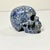 Vintage Home is pleased to offer this hand carved Skull Sculpture. It’s carved from speckled Sodalite. The stone has...