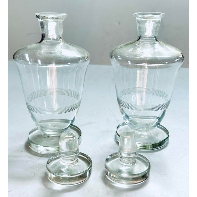 This pair of art deco scent bottles were originally for the ladies boudoir to hold perfumed scents or bath salts. Heavy...