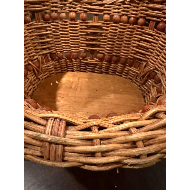 Vintage 1970s Woven Wicker Basket With Wood Bead Detail & Handle For Sale - Image 4 of 14