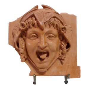 Puck Face Building Terra Cotta Tile