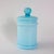 This vintage opaline glass jar with lid, produced in the 1960s in Marinha Grande, Portugal, is a refined example of mid-...