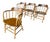 A set of four mid century arm chairs Classic Americana Spindle Back and legs Wood appears to be oak or maple Possibly...