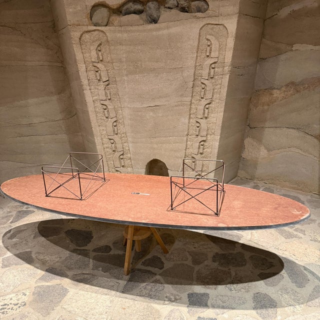 For your consideration, a Herman Miller Eames Elliptical Table (ETR) with a white laminate top and wire base, often called...