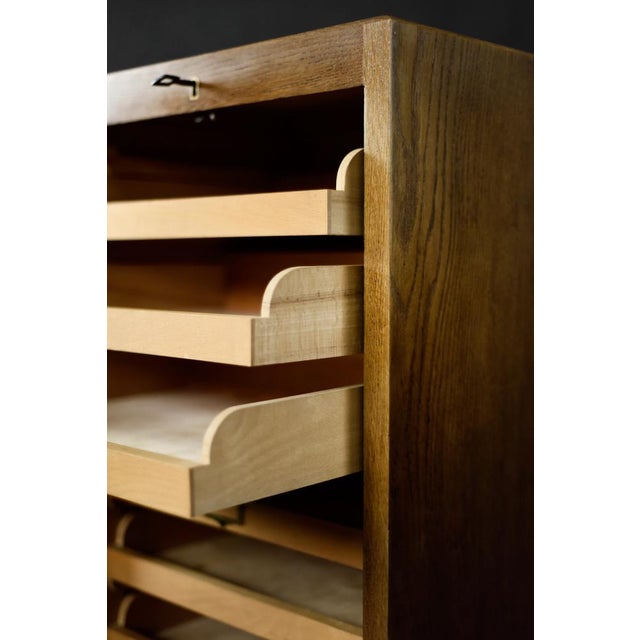 This original roller shutter cabinet was manufactured in Denmark during the 1950s. Industrial design. It is crafted from...