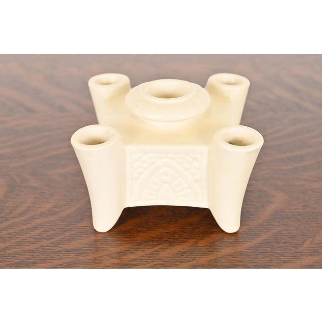 A gorgeous Arts & Crafts period glazed art pottery candlestick holder By Rookwood Pottery USA, 1934 Glazed ceramic in a...