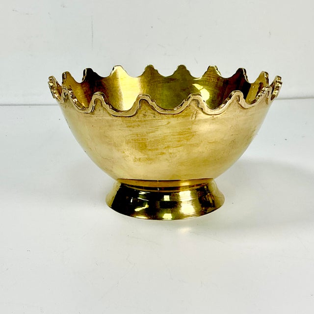 Vintage Home is pleased to present this gorgeous Brass Bowl or Catchall with a Crown edge on the rim. The piece is...