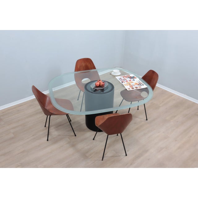 Timeless elegance and essential design come together in this iconic 1970s dining table tobio model, designed by afra &...