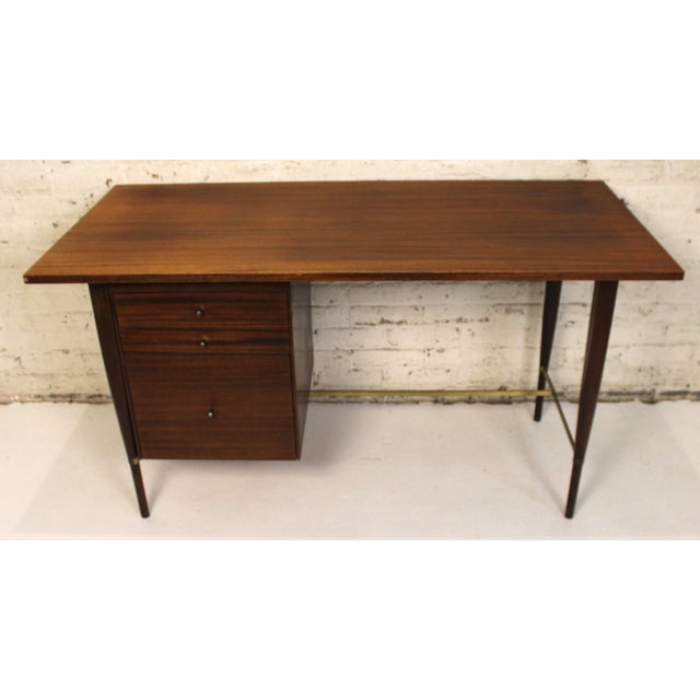 This a stunning mahogany desk is apart of Paul McCobbs Irwin Collection designed for Calvin furniture.. The desk features...
