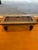 A whimsical postmodern coffee table by Fabian Garcia, created in 1997. The hand-painted wood base features a graphic...