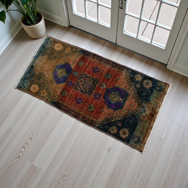 Offered a vintage small rug. Elephant (dark cyan/dark cerulean) background color yastik rug perfect for a small guest bath...