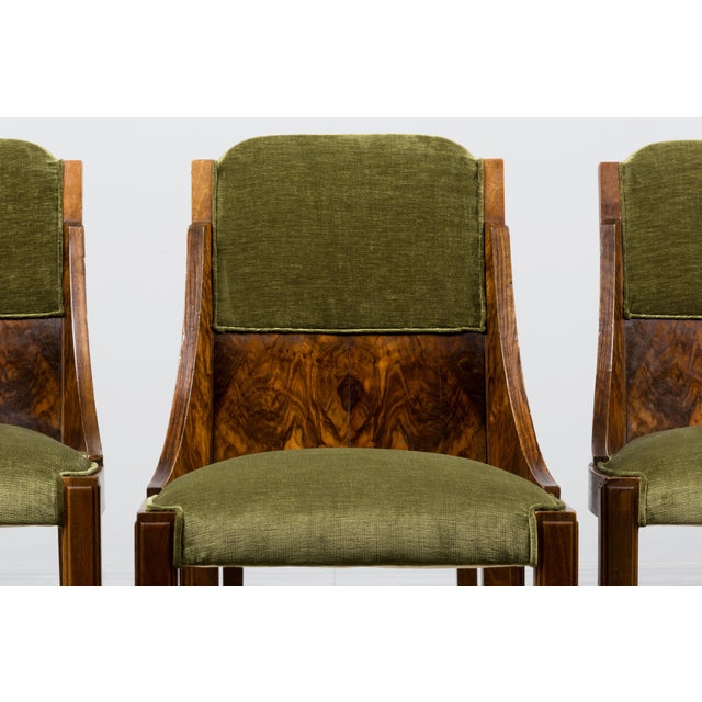 Sourced in Paris, this set of eight French Art Deco dining chairs dates to the late 1920s and reflects the refined...