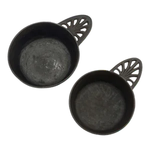 Two Graduated Cast Iron Porringers by Kenrick Iron Mongers, 1790-1830