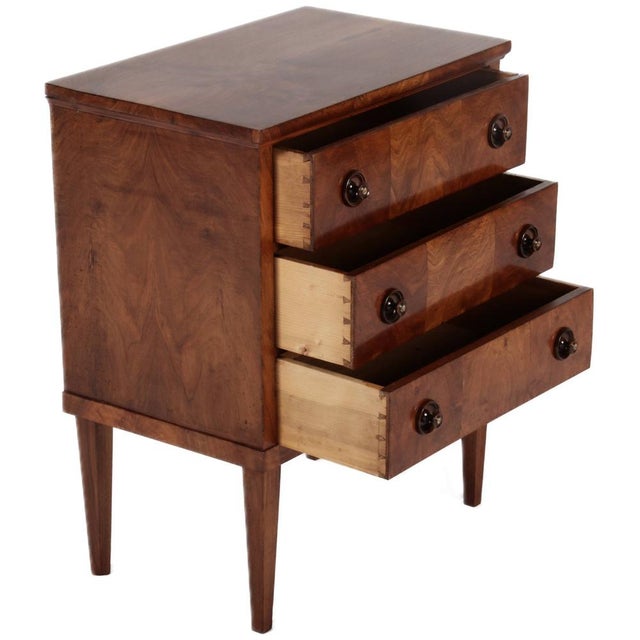 Age and Origin: The chest of drawers is likely from the 1820s or 1830s and probably originates from Switzerland. Material:...