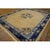 Antique Room Size Wool Ivory Rug, Circa Date: 1920s. This exceptional piece represents the height of early 20th-century...